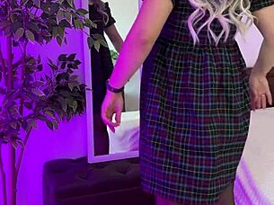 mature milf teases in crotchless panties and stockings while caressing her curvy ass