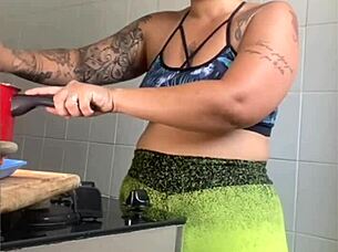 i'm cooking online but really flashing my swollen pussy for you