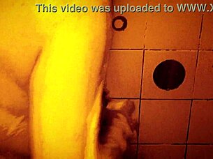 Seductive slow motion shower reveals wet glistening curves