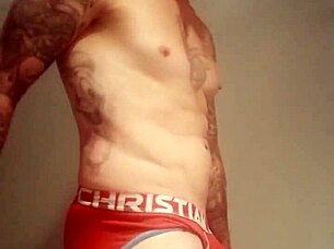 blue eyed tattooed solo girl strokes monster cock hard