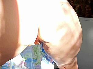 mature woman flashes her huge fanny lips