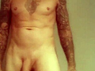 blue eyed tattooed solo girl strokes monster cock hard