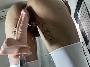 Asian Mei moans as dildo machine drills her tight pussy deep