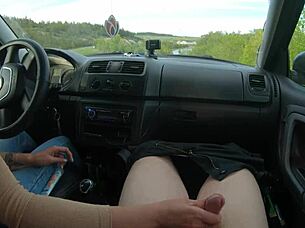 Girlfriend gives hot public road handjob in car to boyfriend's big cock outdoors