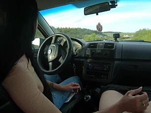 Girlfriend gives hot public road handjob in car to boyfriend's big cock outdoors