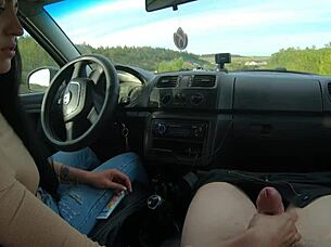 Girlfriend gives hot public road handjob in car to boyfriend's big cock outdoors