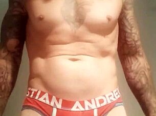 blue eyed tattooed solo girl strokes monster cock hard