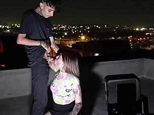 Young blonde goddess dominates two muscular guys with ass worship on the roof.