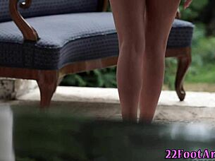 wanna watch this pretty babe ride and suck that monster cock with her feet?