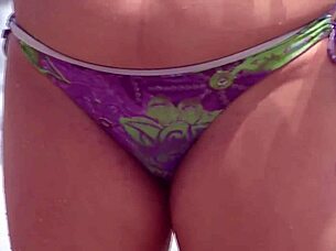 beach milf masturbates eyeing huge cock nearby