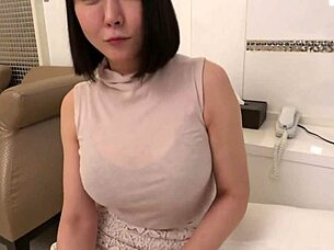 secret footage captures japanese k-cup milf in see-through shorts