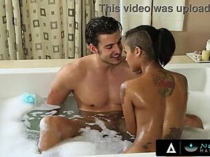 Tattooed ebony babe unleashes angry nuru oiled sex revenge!