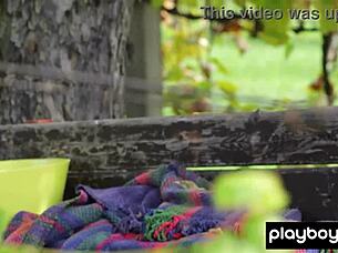 Petite asian katana strips outdoors revealing body