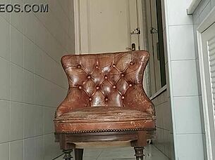 Big dick guy hauls armchair to bathroom for monster cock stroke session