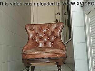 Big dick guy hauls armchair to bathroom for monster cock stroke session