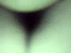 Hairy bitch spreads wide revealing her massive dripping pussy close up