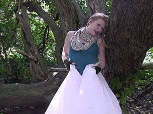 Shaved milf wife masturbates ass on tree outdoors