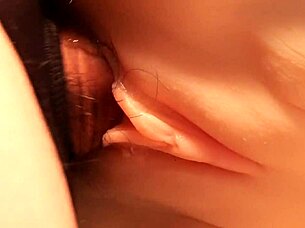 Cock slides deep into her shaved pussy