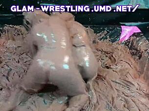 Glamorous big tits clash in messy nude lesbian wrestling