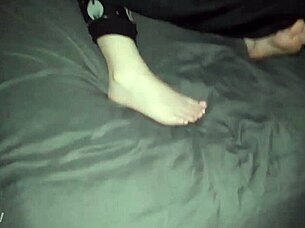 guy spies on her masturbating while sucking those lil toes