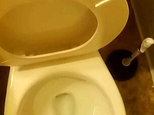 Young cock pissing in toilet tease?
