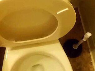Young cock pissing in toilet tease?