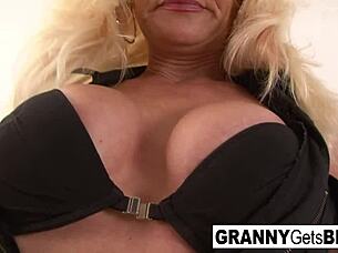 Fake tits bounce on black cock pounding mature pussy