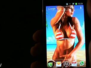 Interactive Bikini Babe Bounces Massive Tits on Beach