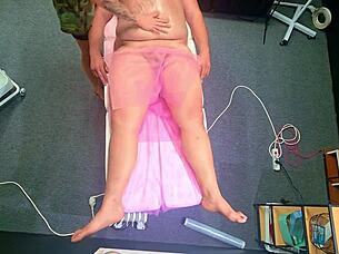 Chubby babe tricks him off massage bed for bdsm anal dildo domination