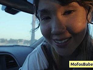 Sexy asian teen shakes natural big boobs for friend in car