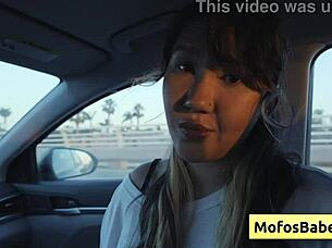 Sexy asian teen shakes natural big boobs for friend in car