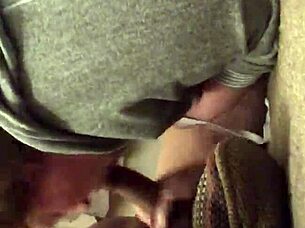 Mature mommy sucks hungrily while fingering her wet pussy