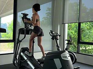 muscular brunette strips naked after sweaty gym workout