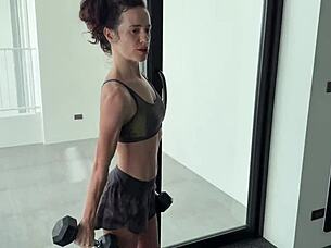 muscular brunette strips naked after sweaty gym workout