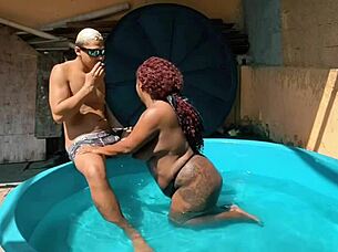blogueira sits poolside on black cock for anal orgasm