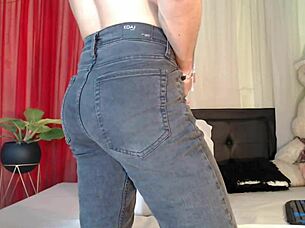 colombian mature in jeans strokes black cock on bed