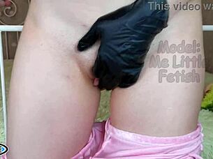 check out this juicy clit masturbation with buttplug and latex gloves