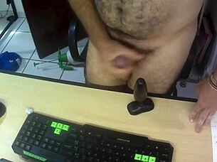 i jerk off my big black cock over desk and cum hard