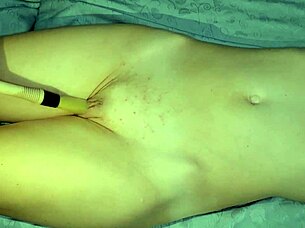 paint brush teases wet shaved pussy close-up