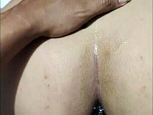 Pounding huge ass first anal toy