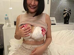 Japanese milf flaunts huge natural tits and beauty