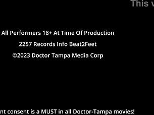 Giggling over giant hot rock foot rub on beach sands