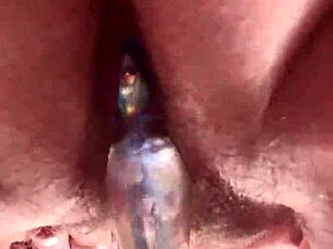 Watch this close-up hairy pussy stretch around glass dildo solo masturbation?