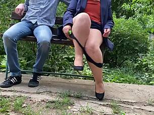 Damn, you won't believe this sexy mature flashing her wet tits in public park