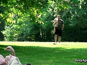 What happens when old man spots sexy shaved blonde in public park skirt?
