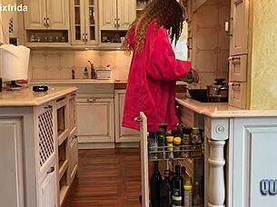 from furry slippers to bare tattooed toes in kitchen