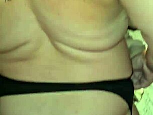 milf slips off panties in hot thong striptease tease