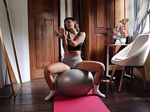 Stretching yoga pants got wet fingering ass with buttplug dripping