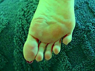 desi beauty shoves glass dildo deep in shaved wet pussy close-up