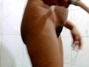 Indian beauty takes a steamy morning bath showing off her curves